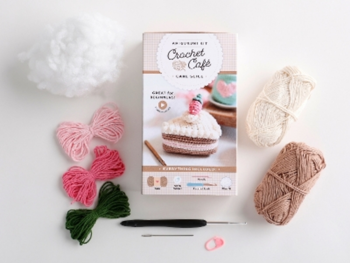 Picture of Crochet Café Amigurumi Kit Cake Slice: Everything You Need Is Included: 100%-Cotton Yarn, Crochet Hook, Stitch Marker, Tapestry Needle, Fiberfill, Step-by-Step Leaflet, and Exclusive Instruction Video